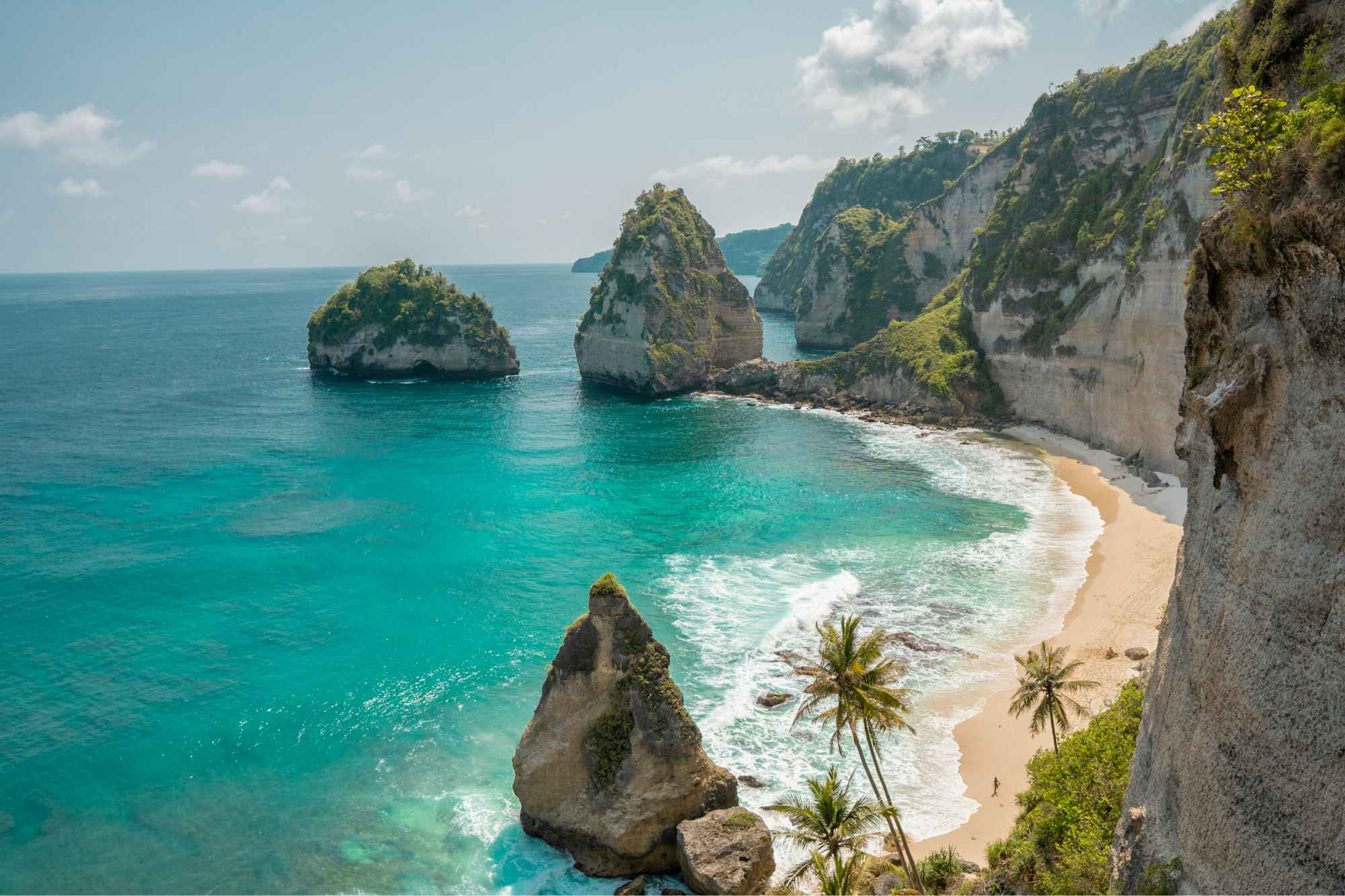 Turquoise sea and rock islands off the coast of Nusa Penida