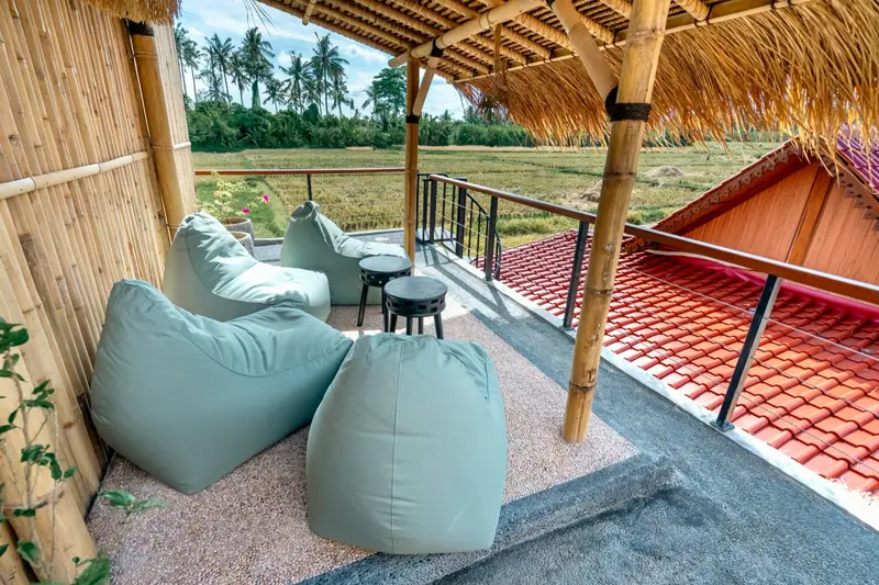 Joglo Hati: bean bags on the upstairs terrace