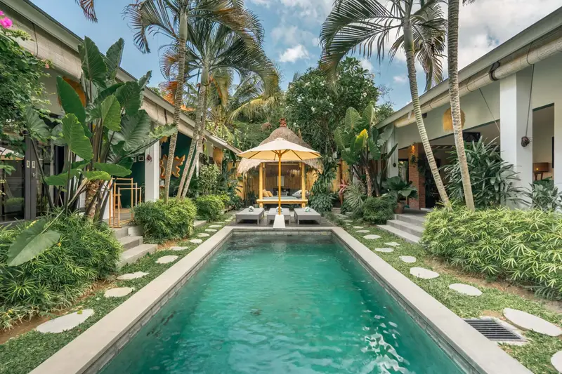 Villa Mint Satu: long pool leading to the garden pavilion