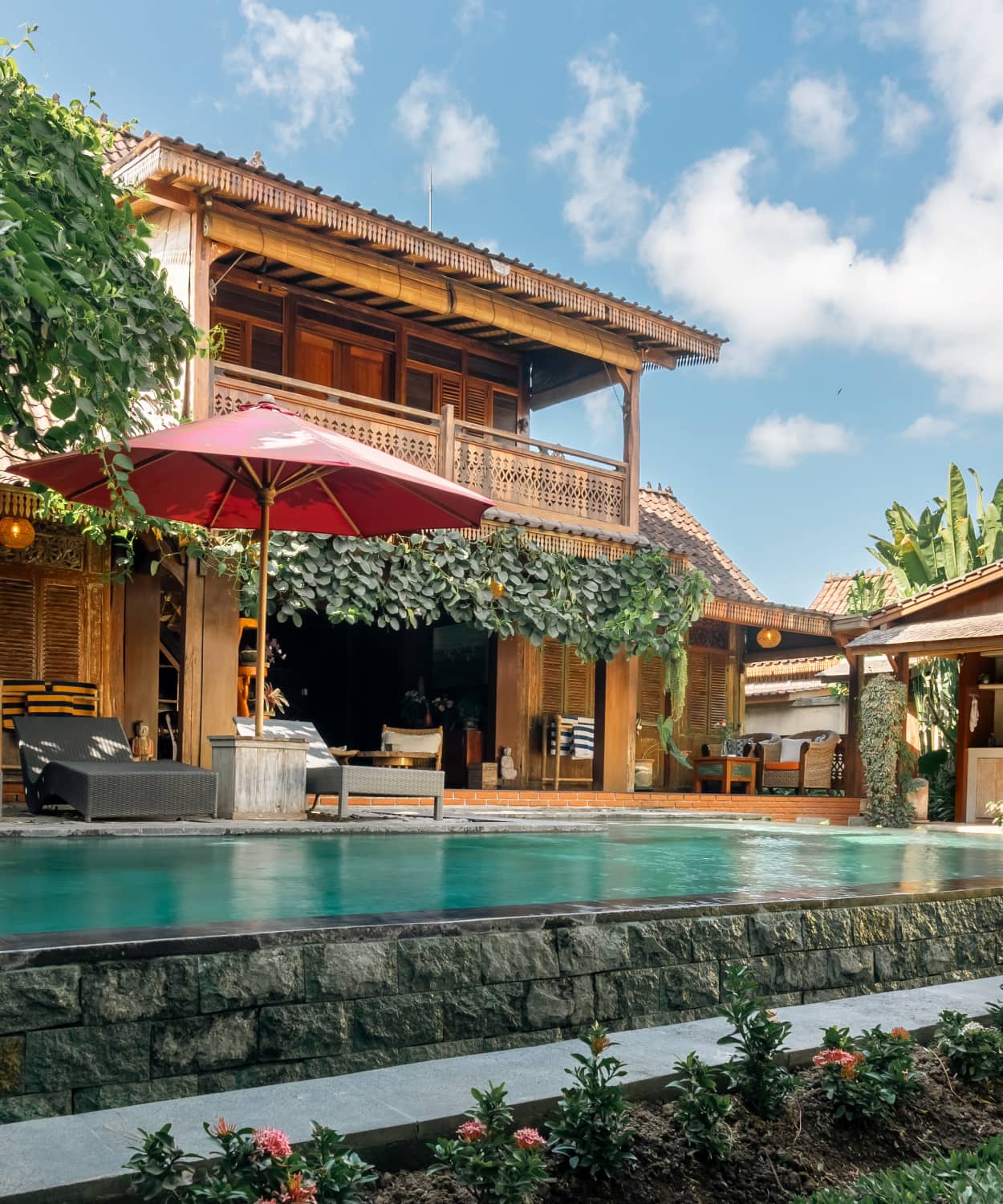 Rumah Elfi: two-storey Joglo house by the pool